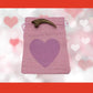 Deinonychus claw cast with Light Pink Bag/Dark Pink Heart gift bag.