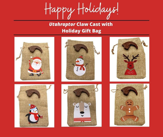 The Utahraptor hand claw cast now comes with a fun and cute Christmas gift bag! Pick from a Santa Claus, Penguin, Snowman, Reindeer, Polar Bear, or Gingerbread
